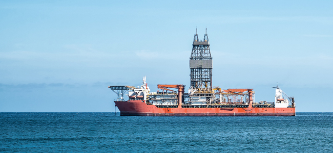 An oil tanker sailing out in the middle of the gulf 