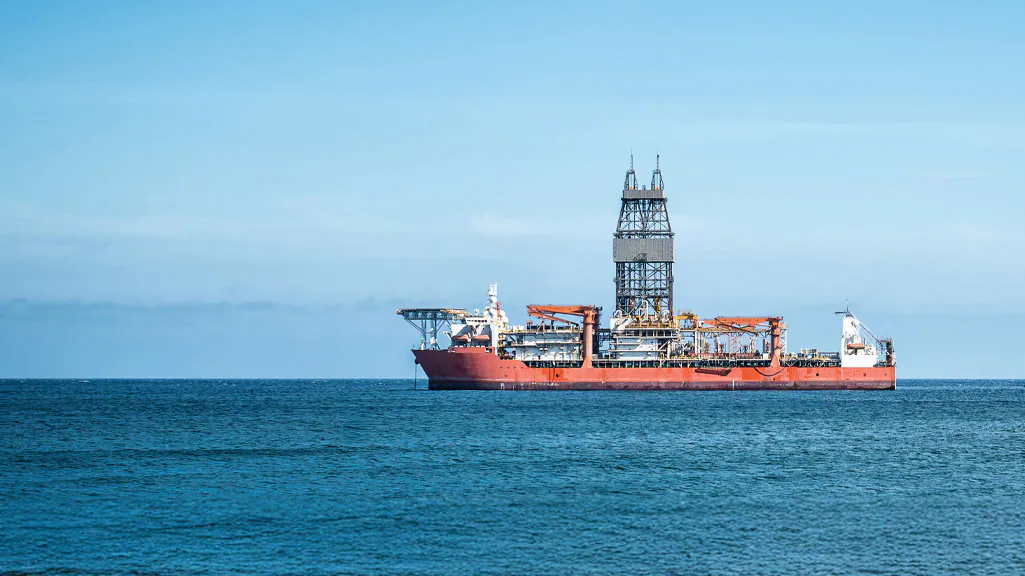 A banner image of the Vortex logo next to an oil tanker